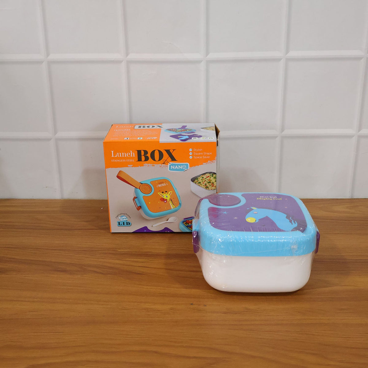 Kids cartoon horse print lunch box displayed on a table.