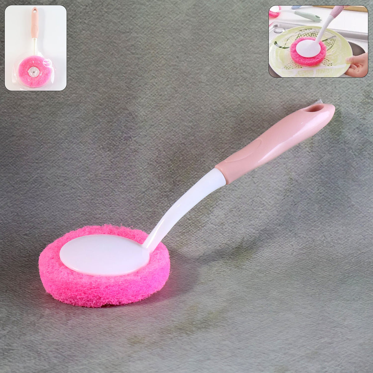 A pink and white long-handled dish scrubber with a round pink scrubbing pad is centered on a gray background.