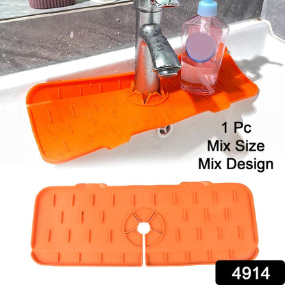 Orange silicone faucet splash guard with a soap dispenser and text overlay on a white sink.