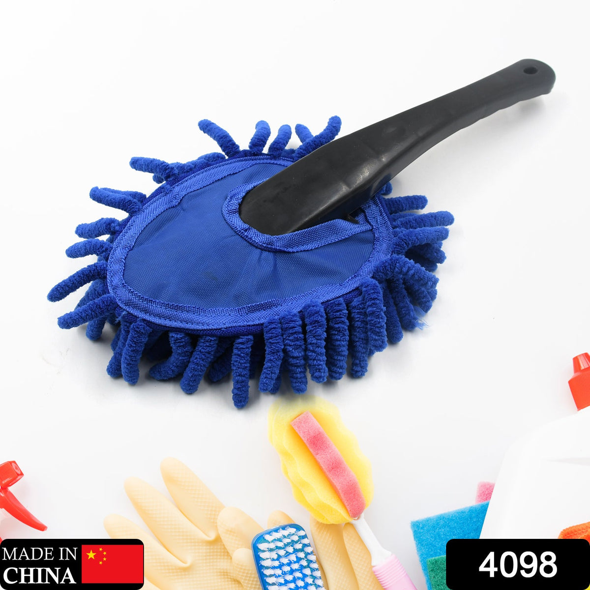 Blue microfiber duster with a black handle surrounded by cleaning supplies including gloves and sponges.