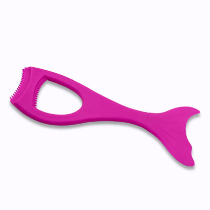 A fuchsia silicone eyeliner and mascara guide tool with a mermaid tail design is displayed on a white background.