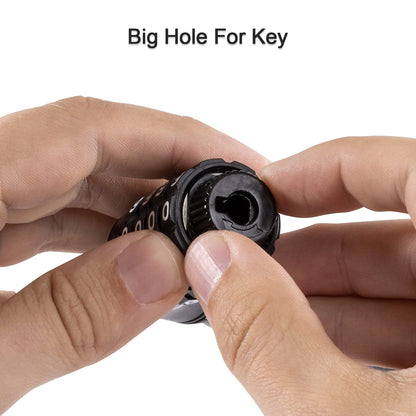 Two hands hold the end of the lock, revealing a large keyhole on the black combination mechanism.