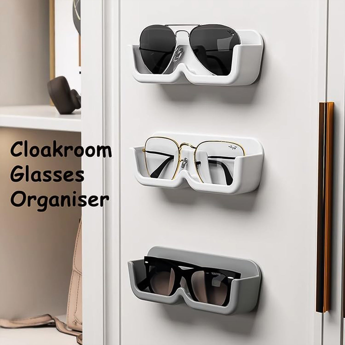 Three wall-mounted glasses holders, two white and one gray, holding different pairs of glasses on a white cabinet.