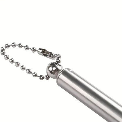 Close-up of the silver ball chain and the end of the silver telescoping handle of the back scratcher.