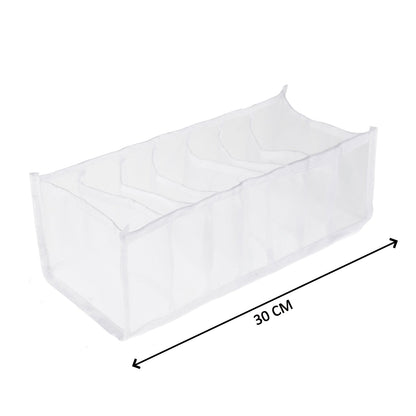 A white mesh organizer with seven empty sections is shown with a 30 cm measurement arrow indicating its length.