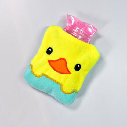 A close-up of the yellow duck hot water bag with a pink cap on a white background.