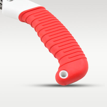 Close-up of the red, ribbed ergonomic handle of the pruning saw, with a white accent near the blade.