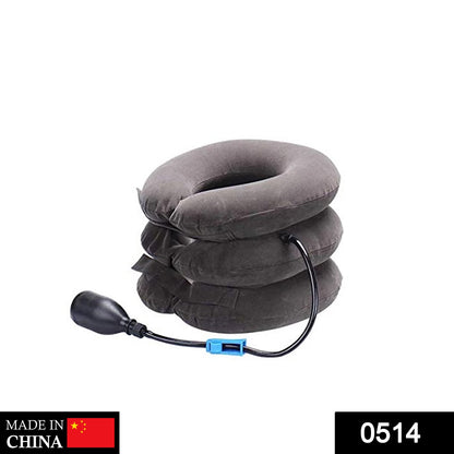 A deflated, three-tier, dark gray inflatable neck traction device with a hand pump and blue clip on a white background.