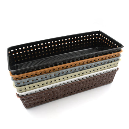 A stack of six rectangular plastic baskets in various colors on a white background.