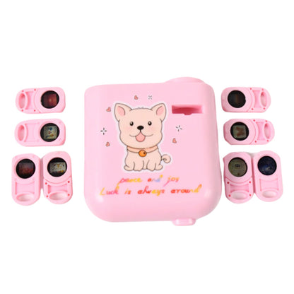 The pink puppy projector and six pink slide cartridges are neatly arranged on a plain white background.
