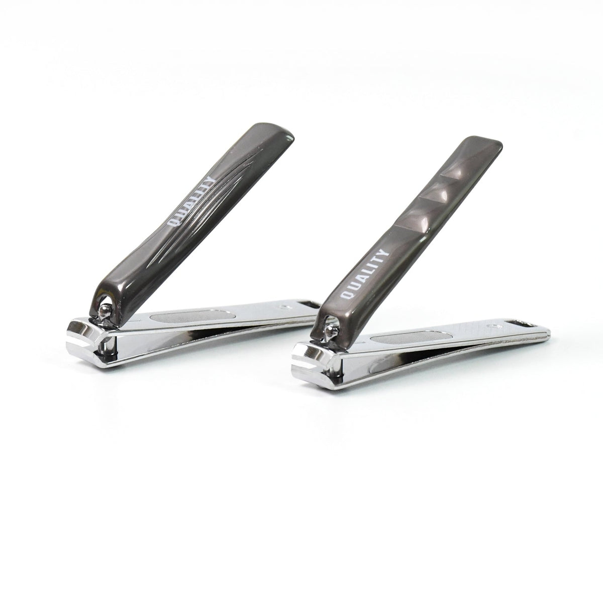 Two black and silver nail clippers, partially open, with the word "QUALITY" on their handles, on a white background.