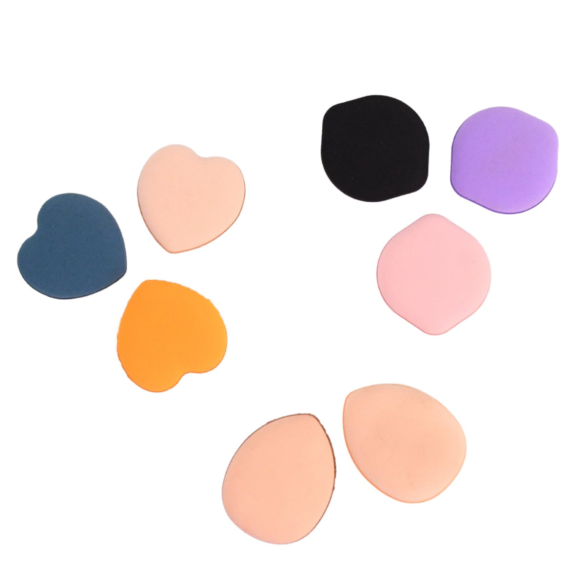 Eight colorful makeup sponges in various shapes and colors arranged on a plain white background.
