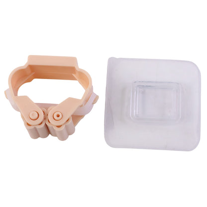 The peach-colored broom holder and a clear self-adhesive hook are presented side-by-side on a white background.