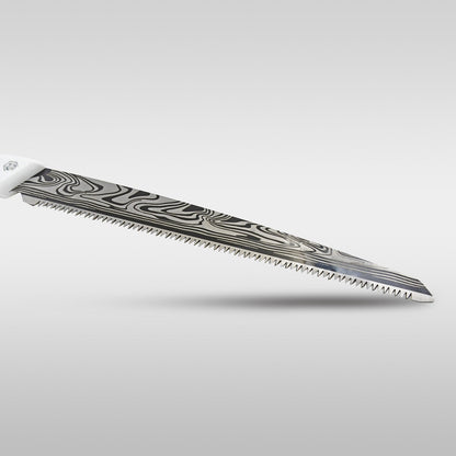 Close-up of the silver blade of the pruning saw, featuring a distinctive wavy, dark pattern and sharp teeth.