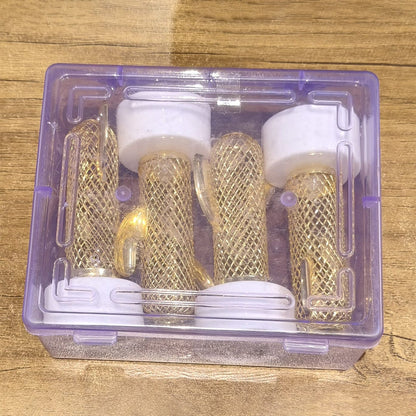 Four cactus-shaped LED lights with gold mesh bodies and white bases are packed neatly in a clear plastic box.