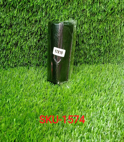 A single roll of black garbage bags with a '17X19' label, sitting on artificial green grass.