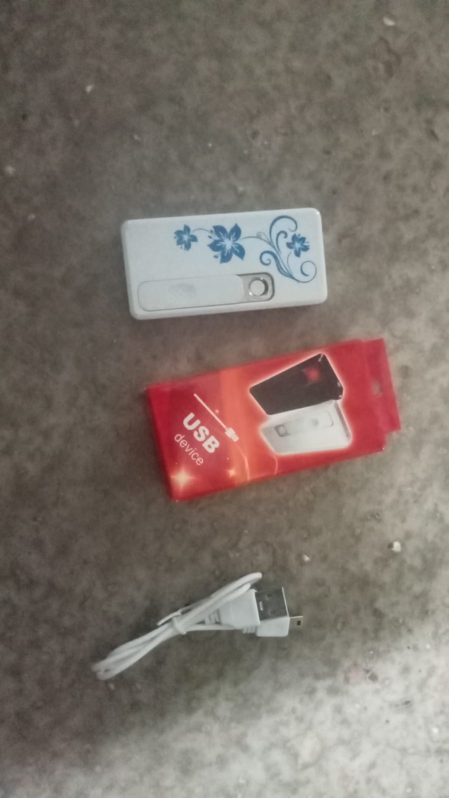 Unisex white USB rechargeable plasma lighter with blue floral design.