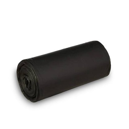 A single roll of black garbage bags lies diagonally on a white background.