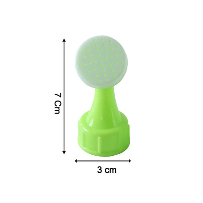 A single green plastic bottle top watering sprinkler with a white top is shown with its dimensions: 7 cm tall and 3 cm wide.