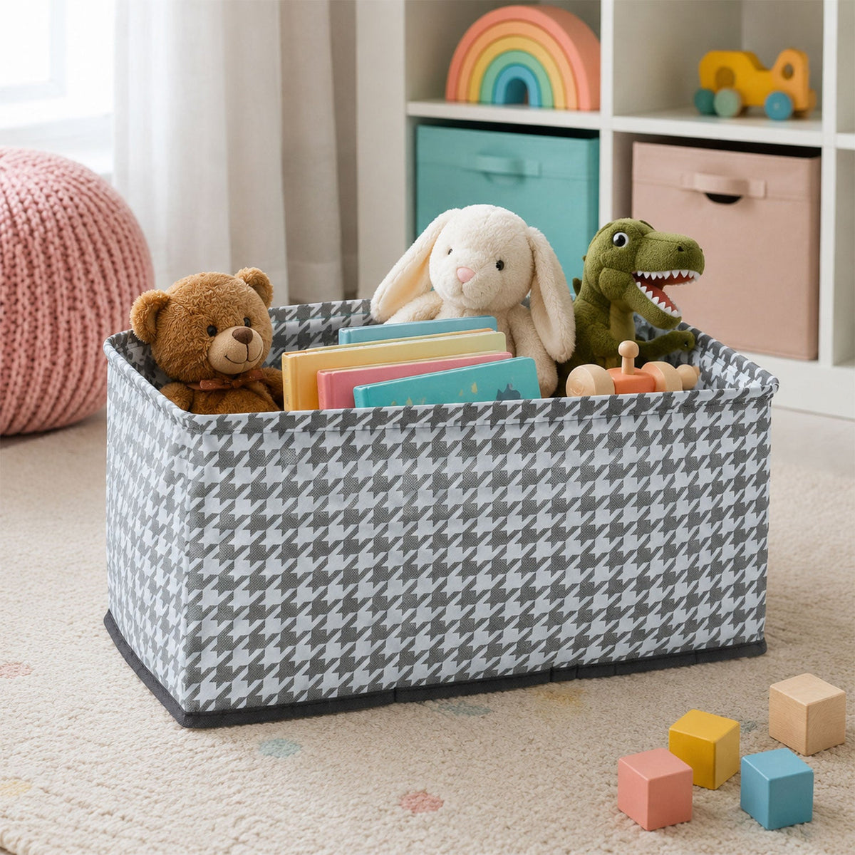 A gray and white houndstooth fabric basket holds a teddy bear, bunny, dinosaur, books, and wooden toys in a child's room.