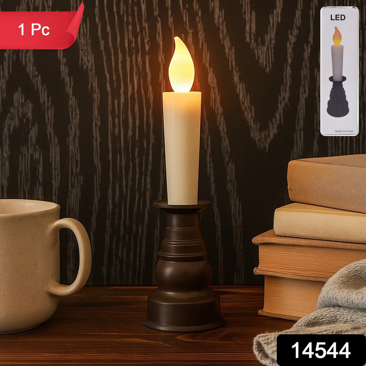 A cream LED candle with a flickering flame in a dark bronze holder, with a box showing the product.