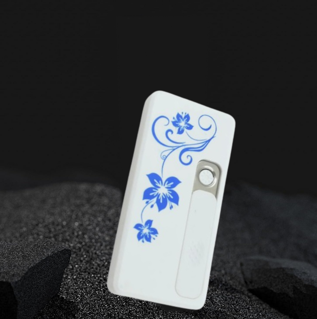White USB lighter with blue floral pattern stands upright on a textured dark surface.