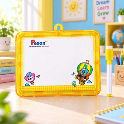 A yellow-framed Pexon writing board with a white surface and cartoon characters on a wooden desk. A yellow and white marker