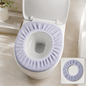 A light purple elastic toilet seat cover on a white toilet, with a small inset showing the cover flat.