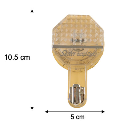 A clear, octagonal self-adhesive hook with a silver hook, showing dimensions of 10.5 cm length and 5 cm width.