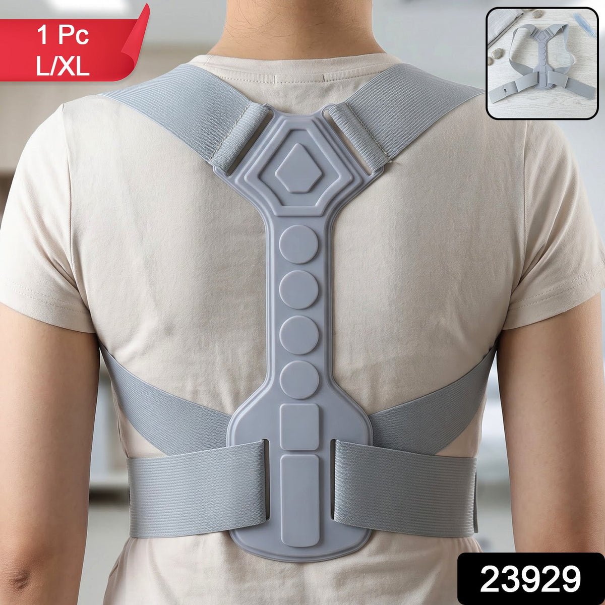 Back view of a person wearing a light gray posture corrector, with a red tag indicating "1 Pc L/XL" and a black tag "23929".