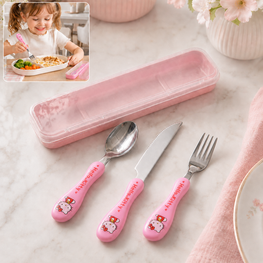 Pink Hello Kitty spoon, knife, and fork next to a pink case, with a child eating in the corner