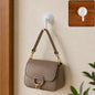 Plastic round suction wall hook in use