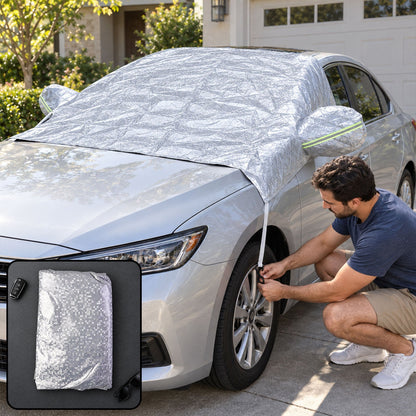 Exterior windshield cover being secured on a parked car