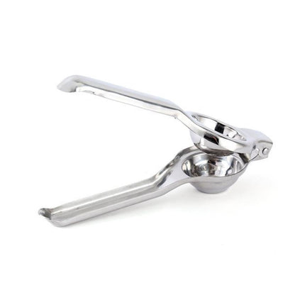 Compact and easy-to-store stainless steel lemon squeezer displayed in a kitchen.