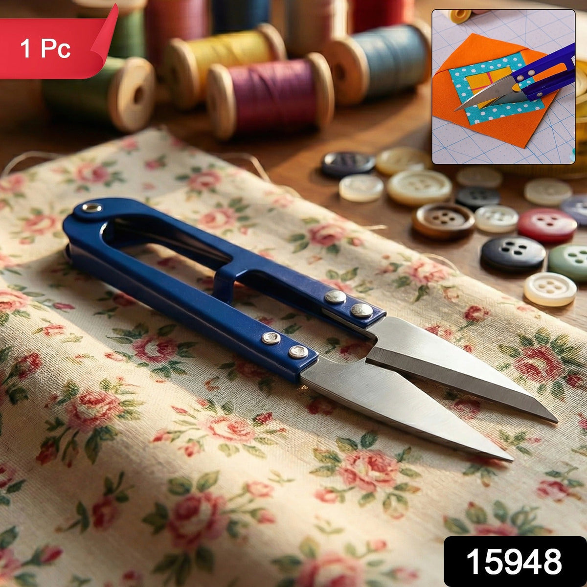 Blue thread snips rest on floral fabric, surrounded by spools of thread and buttons, with an inset showing the snips cutting