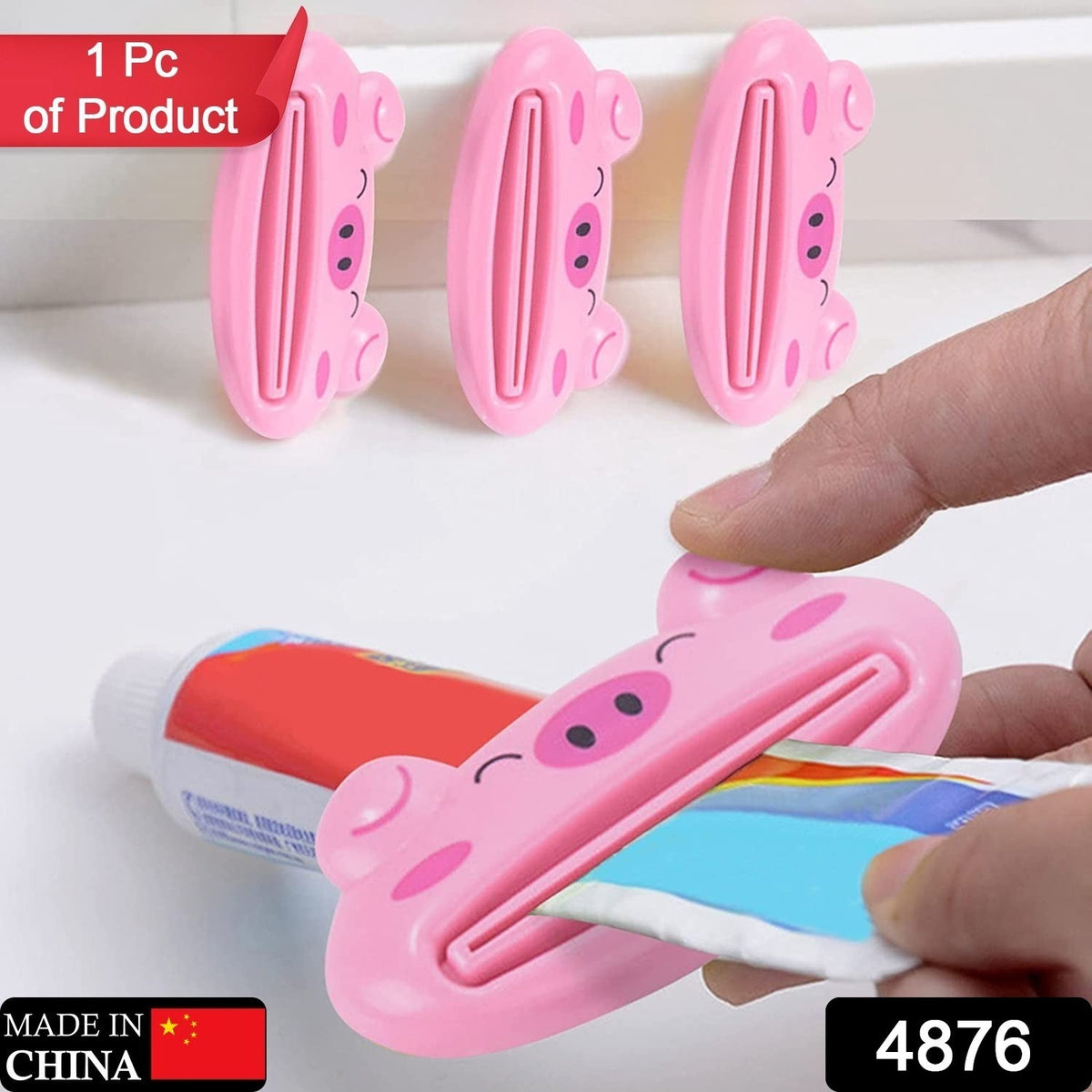 Portable multifunction laptop table with pink pig toothpaste squeezer for home or travel.