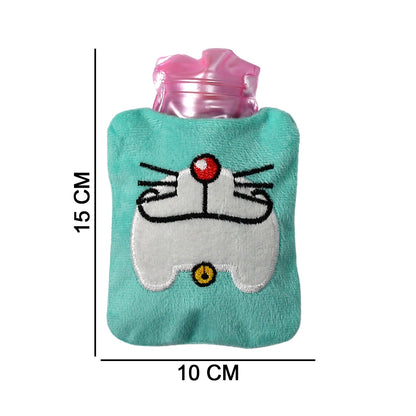 A light blue hot water bag with a Doraemon face design is shown with dimensions of 15 cm by 10 cm on a white background.