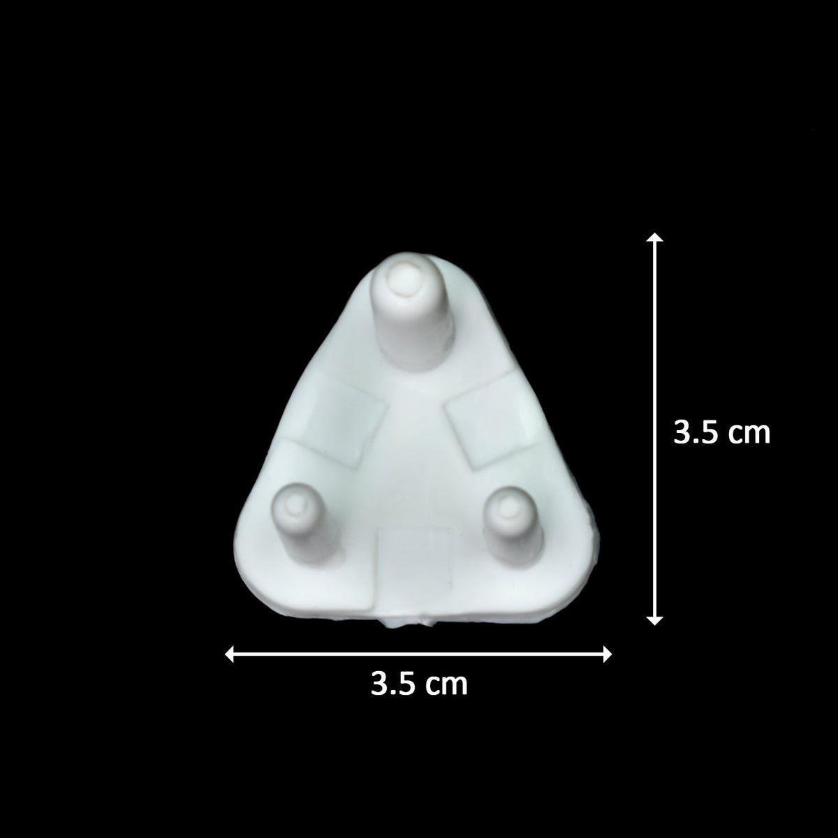 A single white plastic child safety socket cover with dimensions of 3.5 cm by 3.5 cm indicated by lines and text on a black