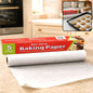 A roll of white non-stick baking paper with its red and green packaging box on a kitchen counter, with an inset showing