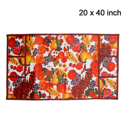 A flat lay of the fruit-patterned refrigerator top cover, displaying its 20 x 40 inch dimensions.
