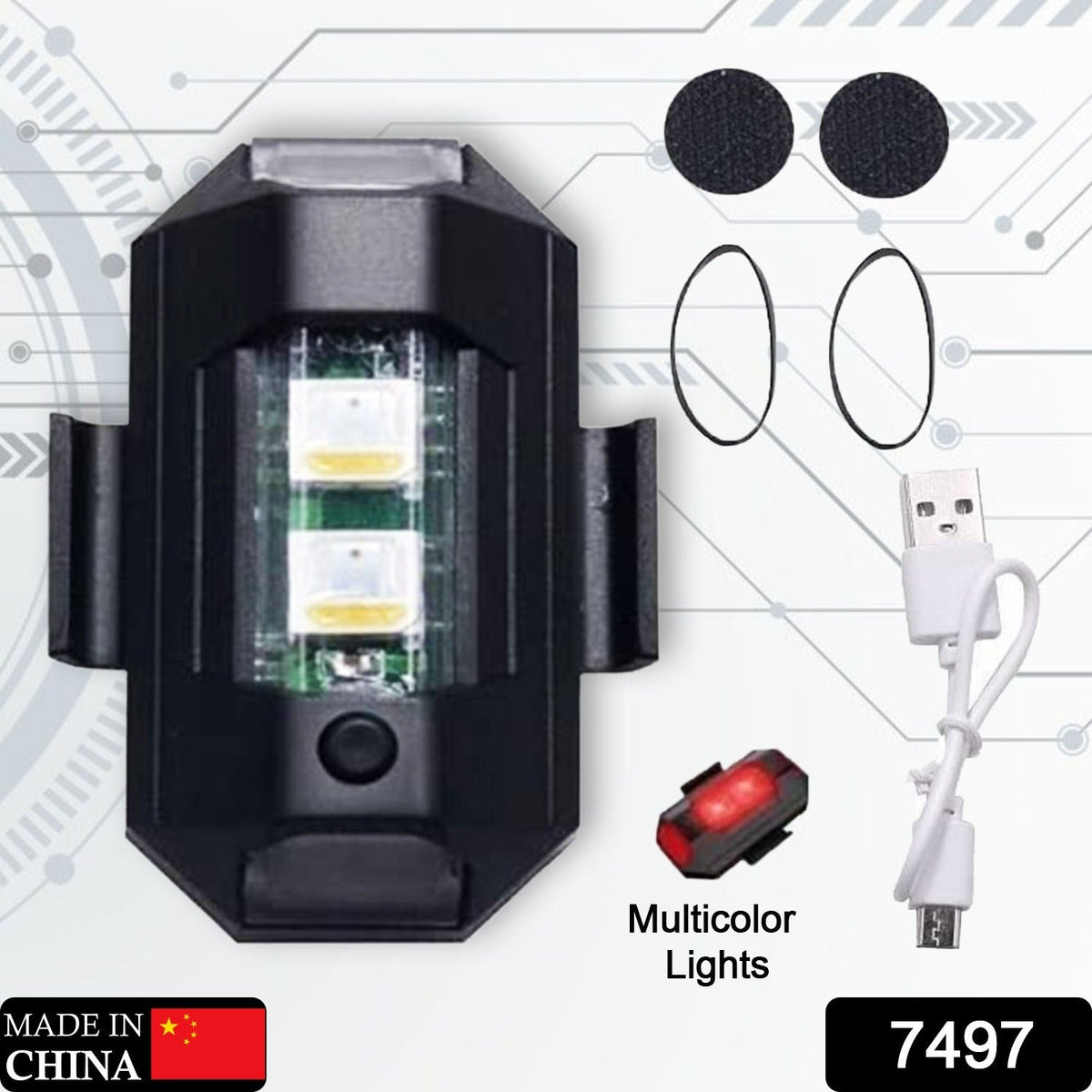 Black LED strobe light, USB cable, two rubber bands, and two round adhesive pads on a grey background.