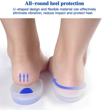 A person's bare feet show clear gel heel cups with blue centers, with arrows indicating heel protection features.