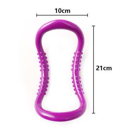A purple pilates ring with textured bumps, showing dimensions of 10cm width and 21cm height.