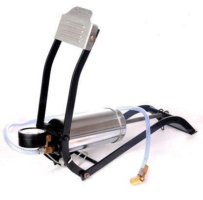 A black and silver foot pump with a pressure gauge and clear hose is angled on a white background.