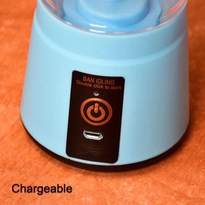 A close-up of the light blue base of the portable juicer blender shows its power button and USB charging port.