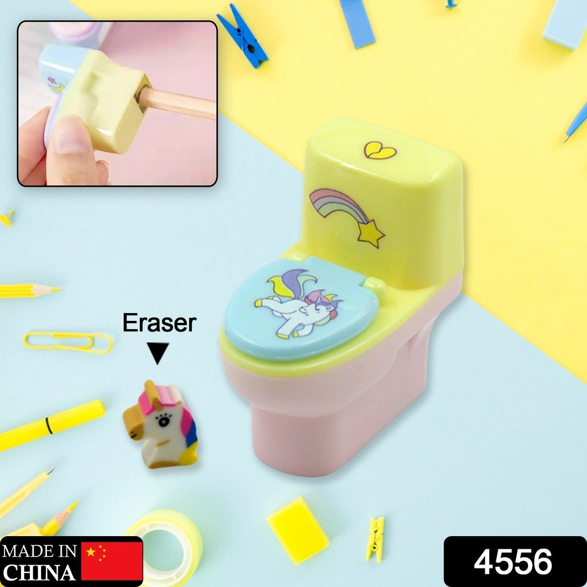 A pastel yellow and pink toilet-shaped pencil sharpener with a unicorn design and a small unicorn eraser are on a blue and