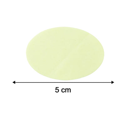 A light yellow oval pad on a white background, with a black double-headed arrow and '5 cm' indicating its length.