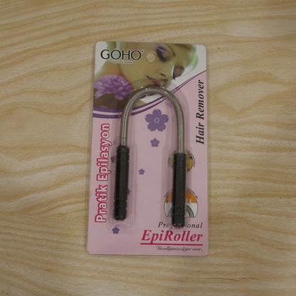 A packaged GOHO Professional EpiRoller hair remover is displayed on a light wooden surface.