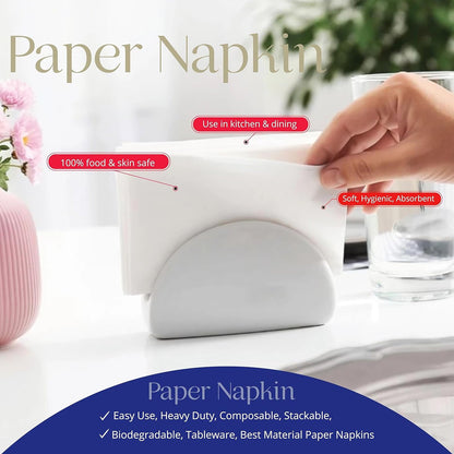 A hand pulls a white paper napkin from a holder, with text highlighting its features.