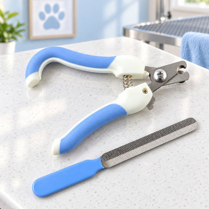 A blue and white pet nail clipper and a matching blue-handled file are displayed on a white speckled countertop.